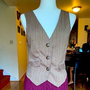 Pin-striped vest.